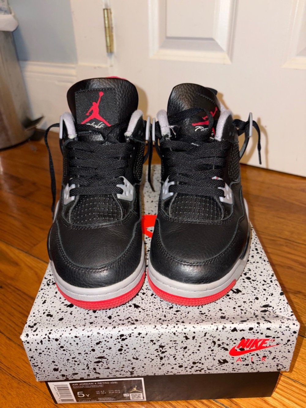 Nike Black and Red Air Jordan 4 Kids Sneakers